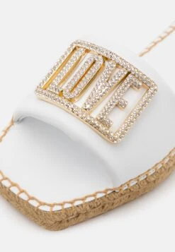 LOVE MOSCHINO Sandalias Planas - Bianco -Hava Tienda de ventas 534898fd23df409aad2ad3b30af130da
