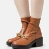 Coach Kenna Bootie - Botines Con Plataforma - Burnished Amber